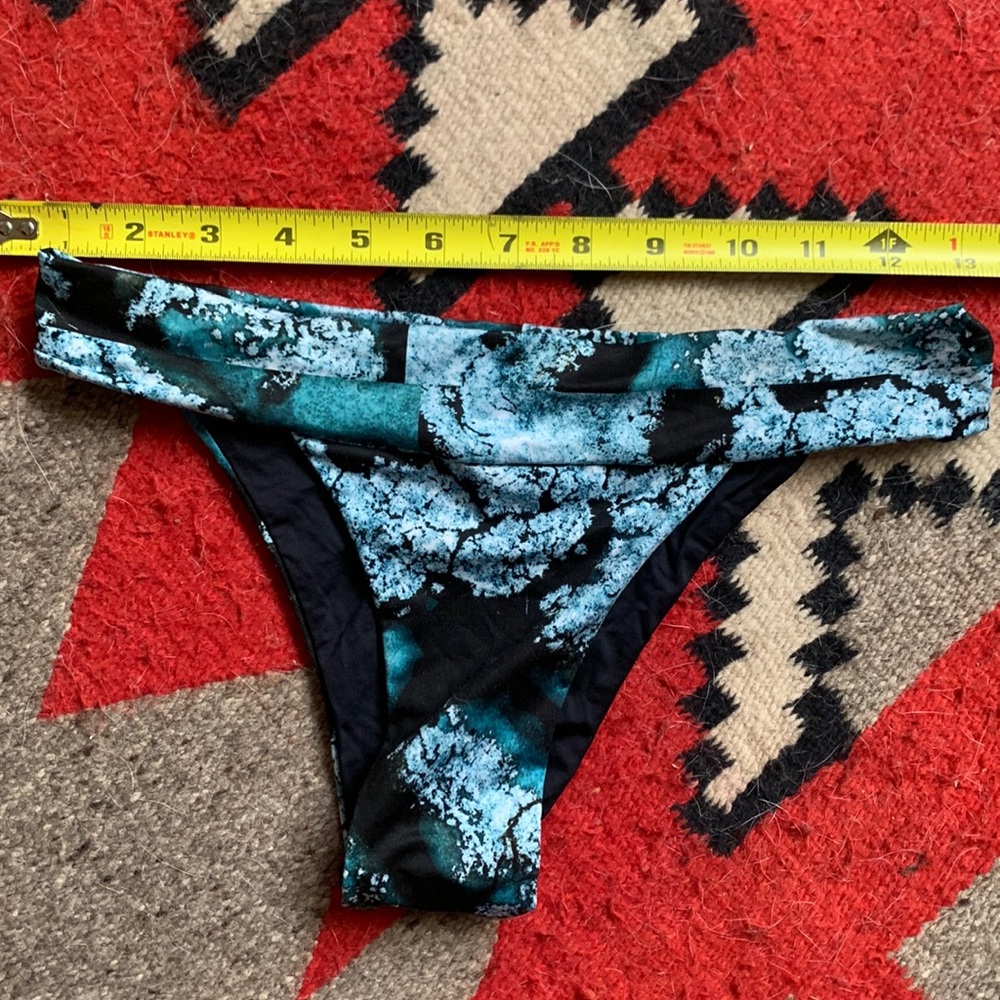 Fully reversible black and wave/ lichen patterned swim bottoms- Small